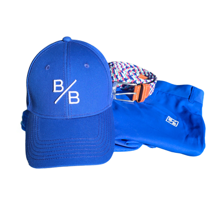 Bright Bogey Electric Blue Short Kit – Men's colorful matching golf clothing set including bright blue performance golf shorts, a structured Caddie Cap, and an elastic braided Vibe Belt.